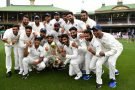 The Indian team poses for a photograph with the Border-Gavaskar Trophy as they celebrate a 2-1 series victory over Australia following play being abandoned in the fourth test match between Australia and India at the SCG in Sydney